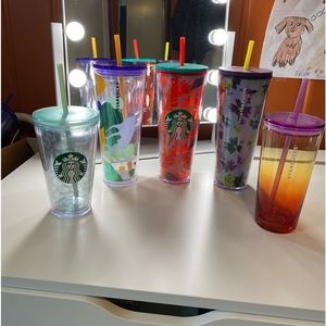 Five lightly used Starbucks cups